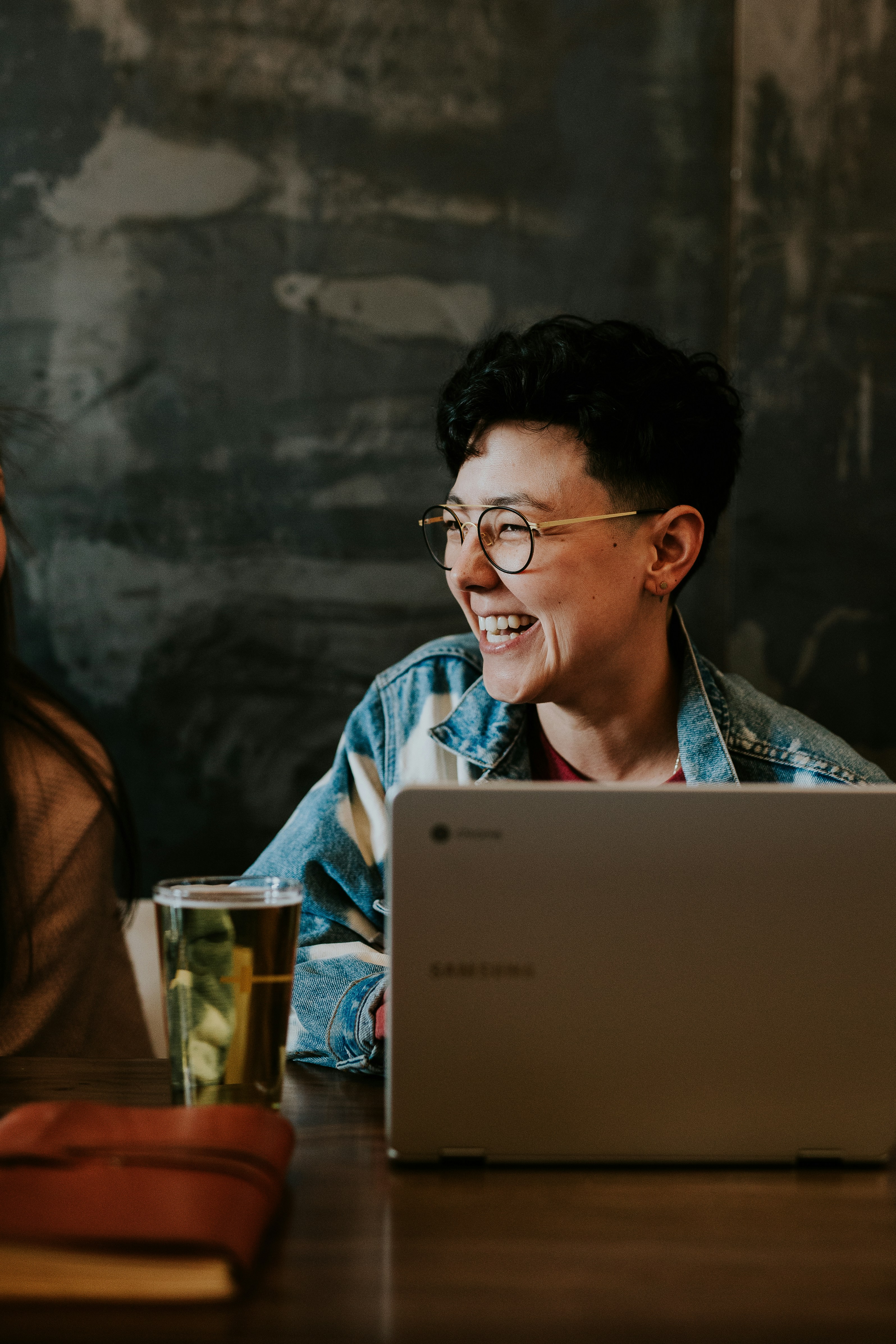Professional reviewing AI tools on laptop